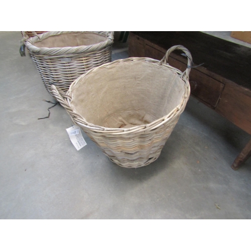 2300 - A wicker twin handled log basket