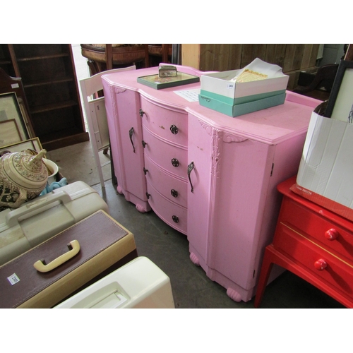 2278 - A pink painted sideboard, four central doors flanked by two cupboard doors