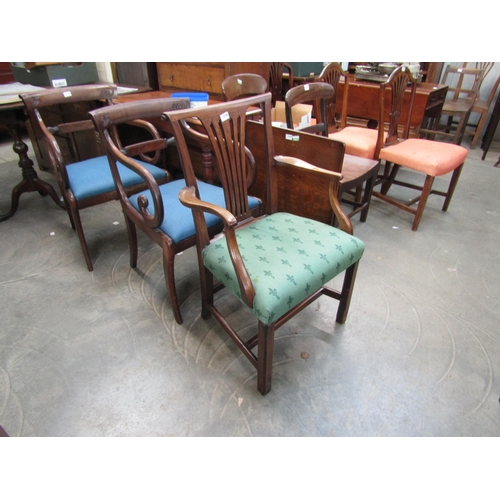 2163 - A Georgian mahogany open arm chair