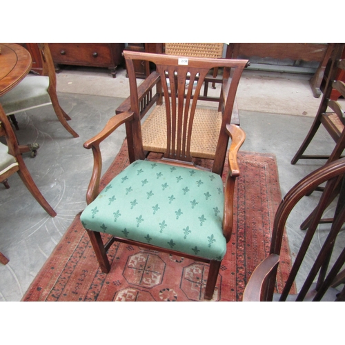 2163 - A Georgian mahogany open arm chair