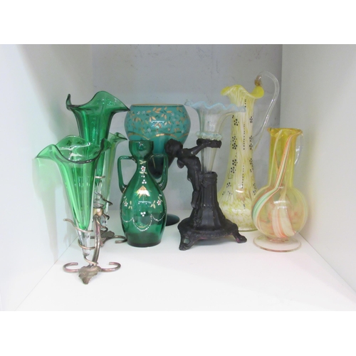 1427 - A glass three trumpet epergne, two jugs, vase and goblet and a figural epergne