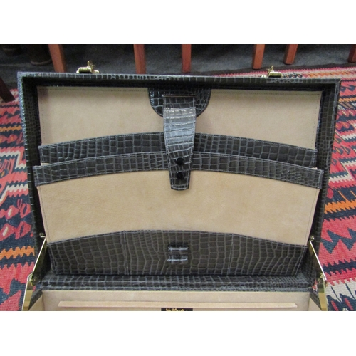 1008 - A John Bennett, London, faux crocodile skin attache case   (R)  £30