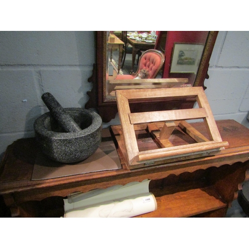 1067 - A hardwood bookstand and a black marble pestle and mortar (2)