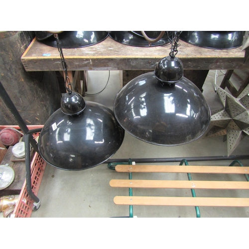 2032 - A pair of black and gold ceiling pendant lights