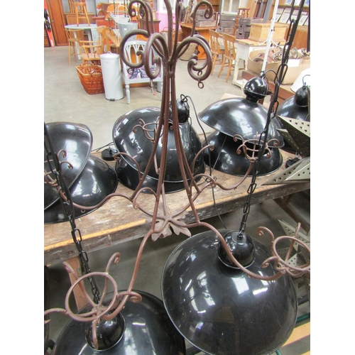 2037 - A wrought metal five branch candelabra   (R)