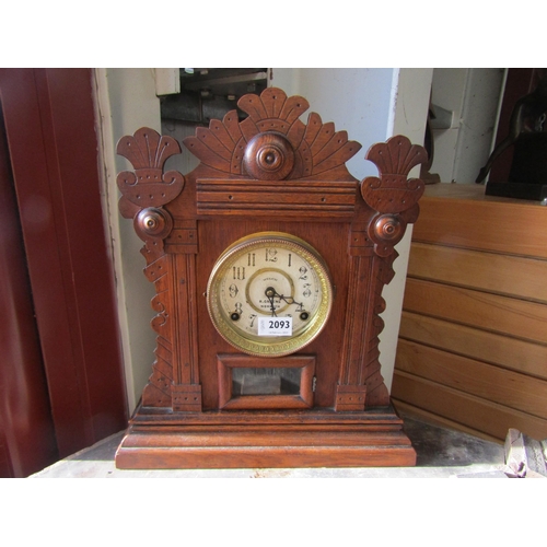 2093 - An Edwardian oak framed gingerbread mantel clock, Welch R.Greene, Norwich, 8 day movement