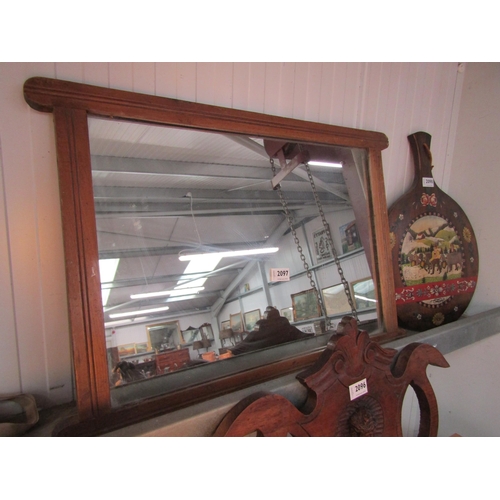 2097 - An oak framed mirror   (E) £8-12