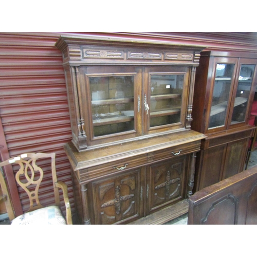 2099 - A continental carved oak glazed top dresser, two sections   (E) £40-60