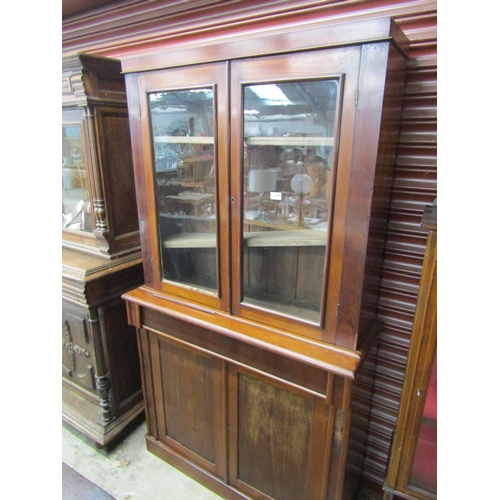 2100 - A Victorian mahogany glazed top bookcase