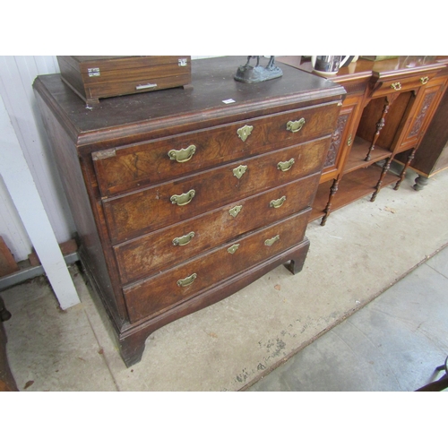 2119 - An early Georgian figured walnut graduating chest of four drawers on bracket base, formally a bottom... 