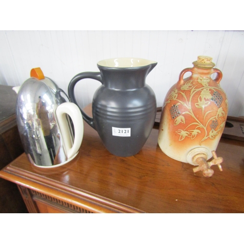 2121 - A teapot, jug and vinegar top