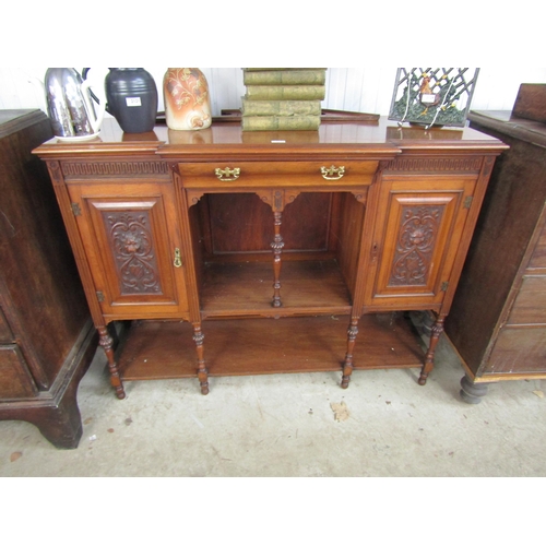 2122 - An Edwardian mahogany break front sideboard