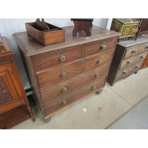 2128 - A Victorian mahogany two over three chest of drawers