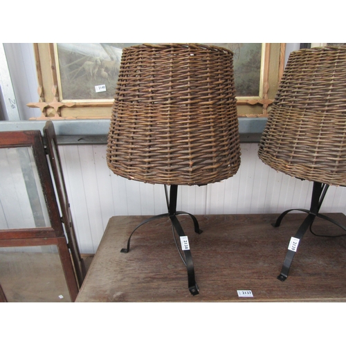 2138 - A wrought iron and wicker table lamp   (R) £15