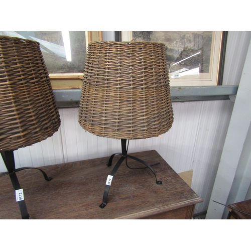 2139 - A wrought iron and wicker table lamp   (R) £10