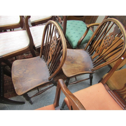 2160 - A pair of 19th Century wheel back kitchen chairs