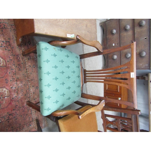 2163 - A Georgian mahogany open arm chair