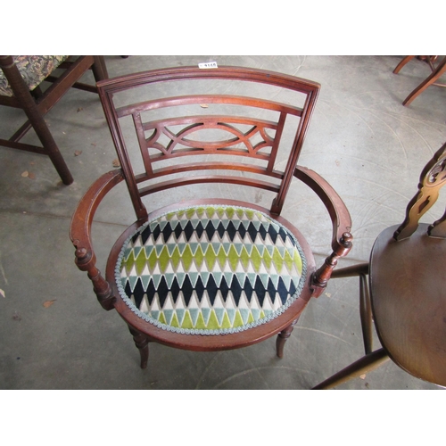 2168 - An Edwardian oval upholstered chair