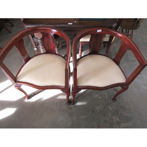 2175 - A pair of early 20th Century mahogany tub chairs    (R) £40