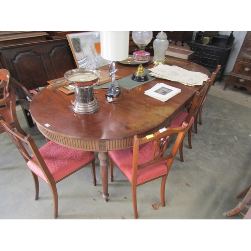 2185 - A Georgian style mahogany eight  legged table by Redman and Hales, in two sections 227 x 122cm