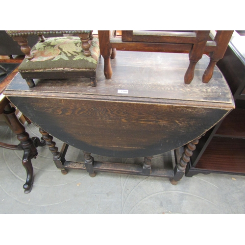 2203 - A 1930's oak drop slap barley twist gateleg table