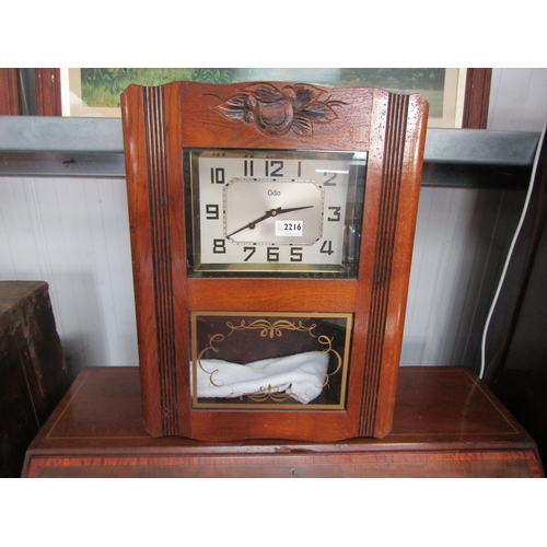 2216 - A 1940's oak wall clock