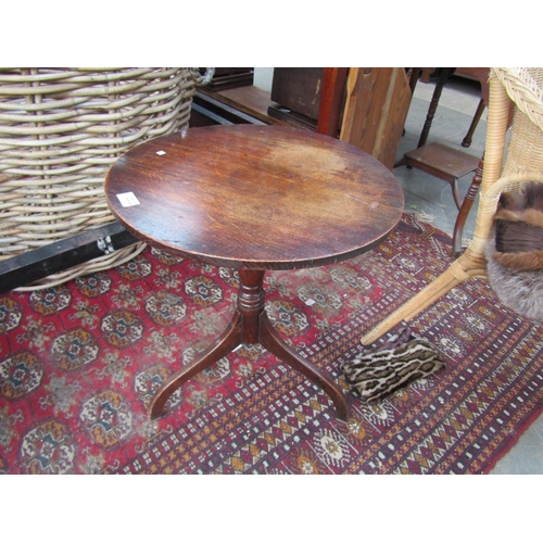 2222 - A Regency oak tripod coffee table