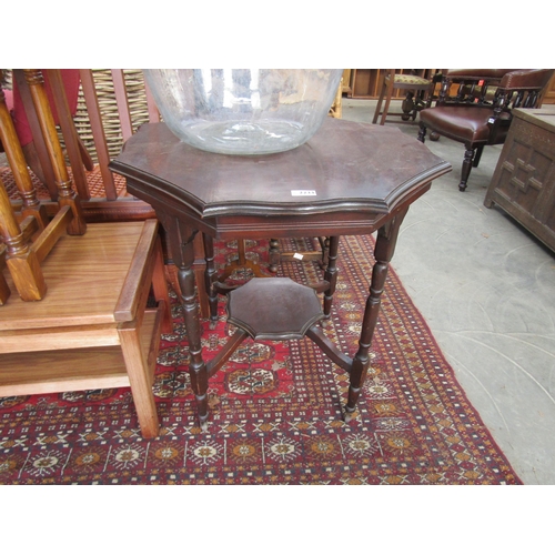 2233 - An Edwardian walnut shaped top occasional table