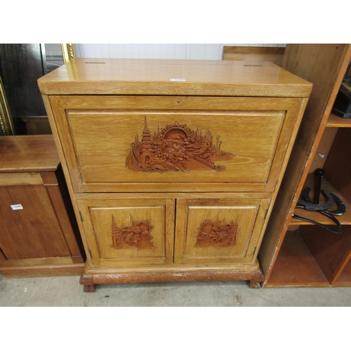 2249 - A Chinese carved hardwood drinks cabinet    (R) £30