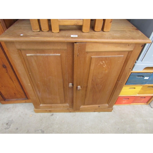 2263 - A modern pine two door desk cupboard fitted shelf