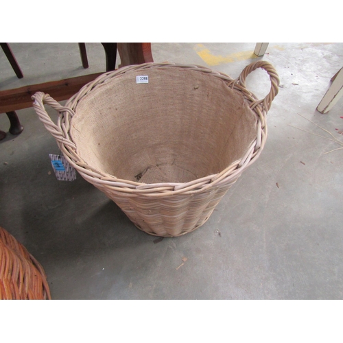 2298 - A large wicker twin handle basket, hessian lined