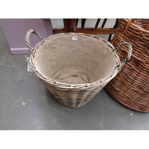 2300 - A wicker twin handled log basket