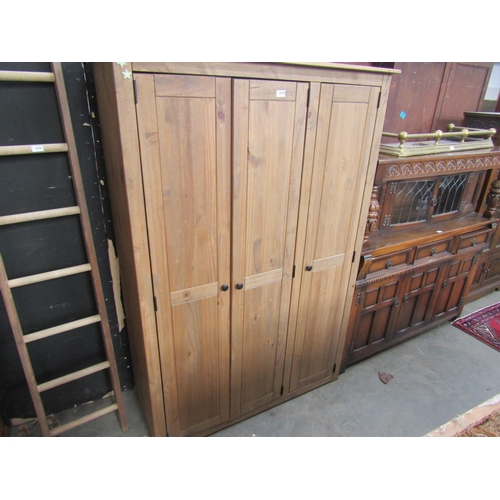 2332 - A Mexican pine three door wardrobe