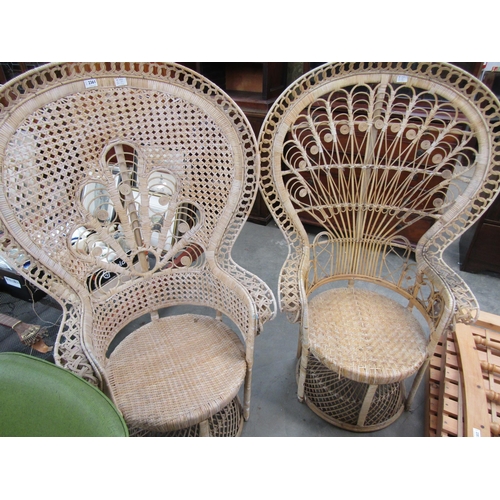 2361 - A similar pair of Retro cane peacock chairs