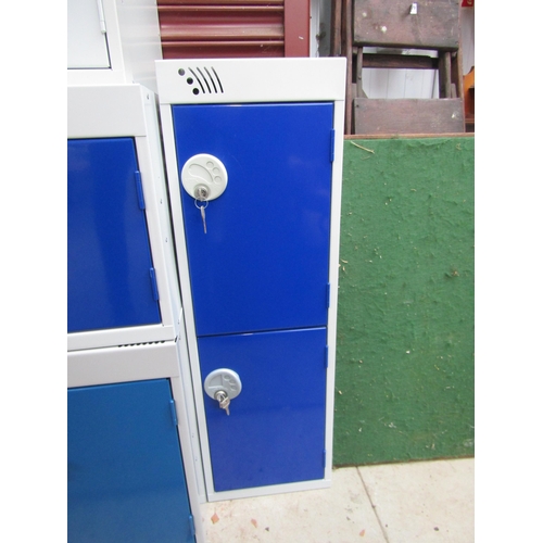 2378 - A two door metal locker with keys   (R)  £20