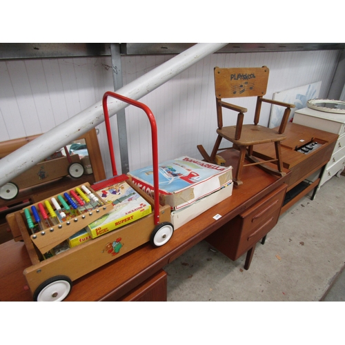 2390 - A child's rocking chair, box of children's games and stroller   (E)  £10-20