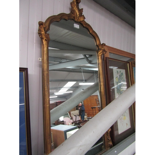 2393 - An ornate gilt mirror with acanthus detail