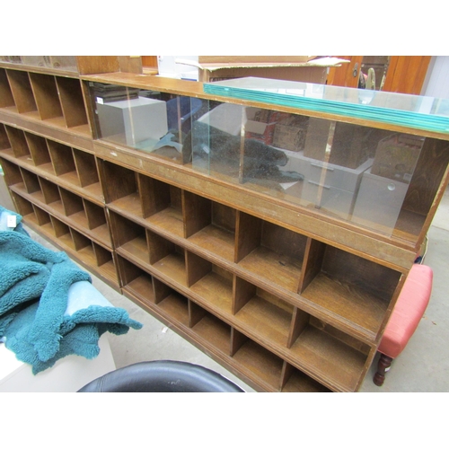 2410 - A pair of 1950's Unix oak stacking bookcase of four sections and two bases