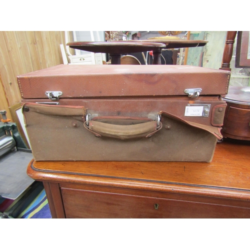 2428 - A Edwardian gentleman's campaign travelling case with fitted vanity case to interior