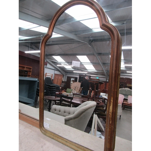 2433 - A small gilt arch top wall mirror