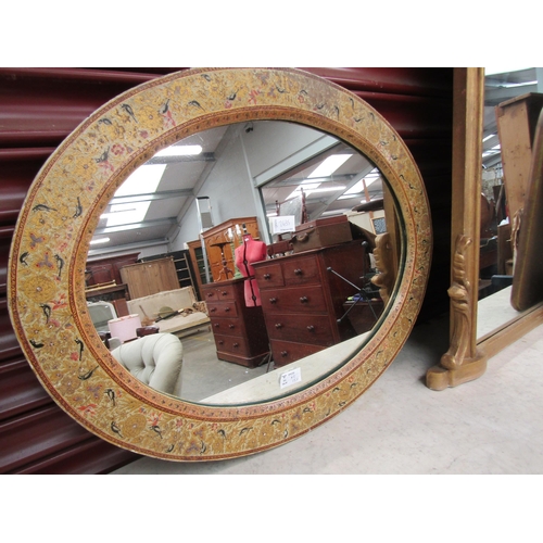 2435 - A decorative oval mirror