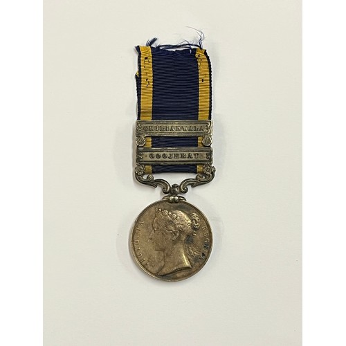 9470 - A Victorian Punjab Medal (1849), the obverse with Wyon profile of Queen Victoria, the reverse depict... 