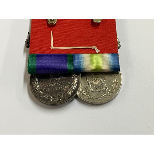 9474 - A South Atlantic Medal (1982) with rosette denoting service in the combat zone, for personnel who to... 