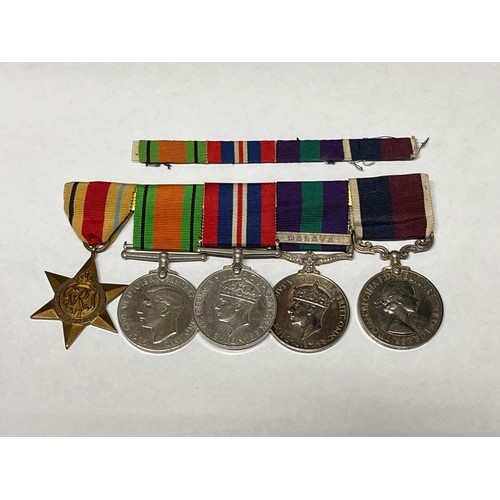 9480 - A WWII and later medal group of five consisting of Africa Star, Defence Medal, War Medal, George VI ... 