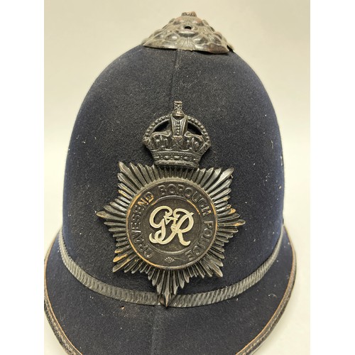 9257 - A Gravesend Borough Police helmet, rose top, King’s crown to badge, with chinstrap