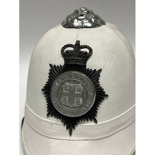 9259 - A Durham County Constabulary white police helmet, rose top, Elizabeth II crown badge