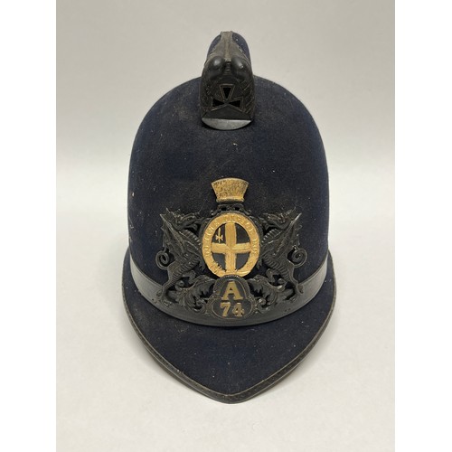 9262 - A City of London Police helmet, cox comb, A24 numbered to badge, liner a/f