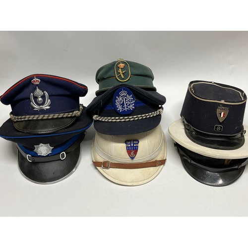 9393 - A quantity of European police headwear including Belgian and French Kepi