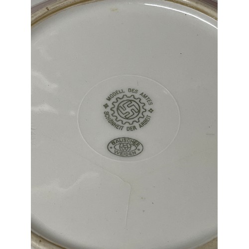 9145 - A Third Reich era German white porcelain bowl, the reverse with ‘Modell des Amtes Schonheit der Arbe... 