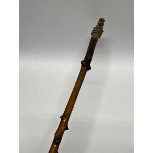 9214 - A walking stick with brass telescope top, parts missing and adapted